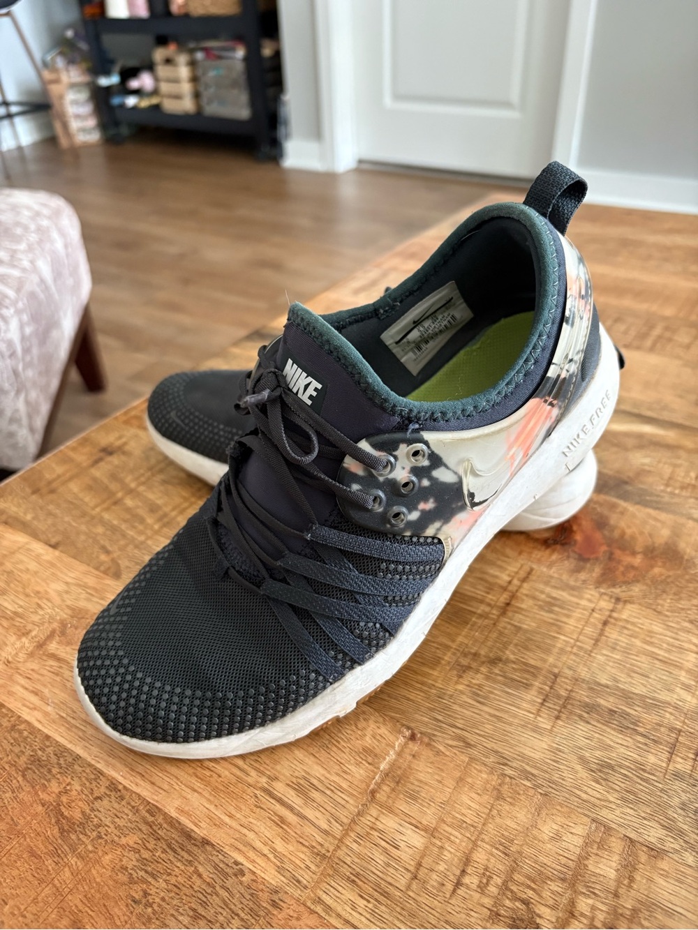 Nike Black Knit Sneakers with White Sole and Marble Heel Accent